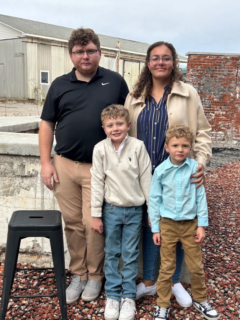 Image of the Bonar family. Back row left to right: Austin, Cierra. Front row left to right: Liam, Deacon.