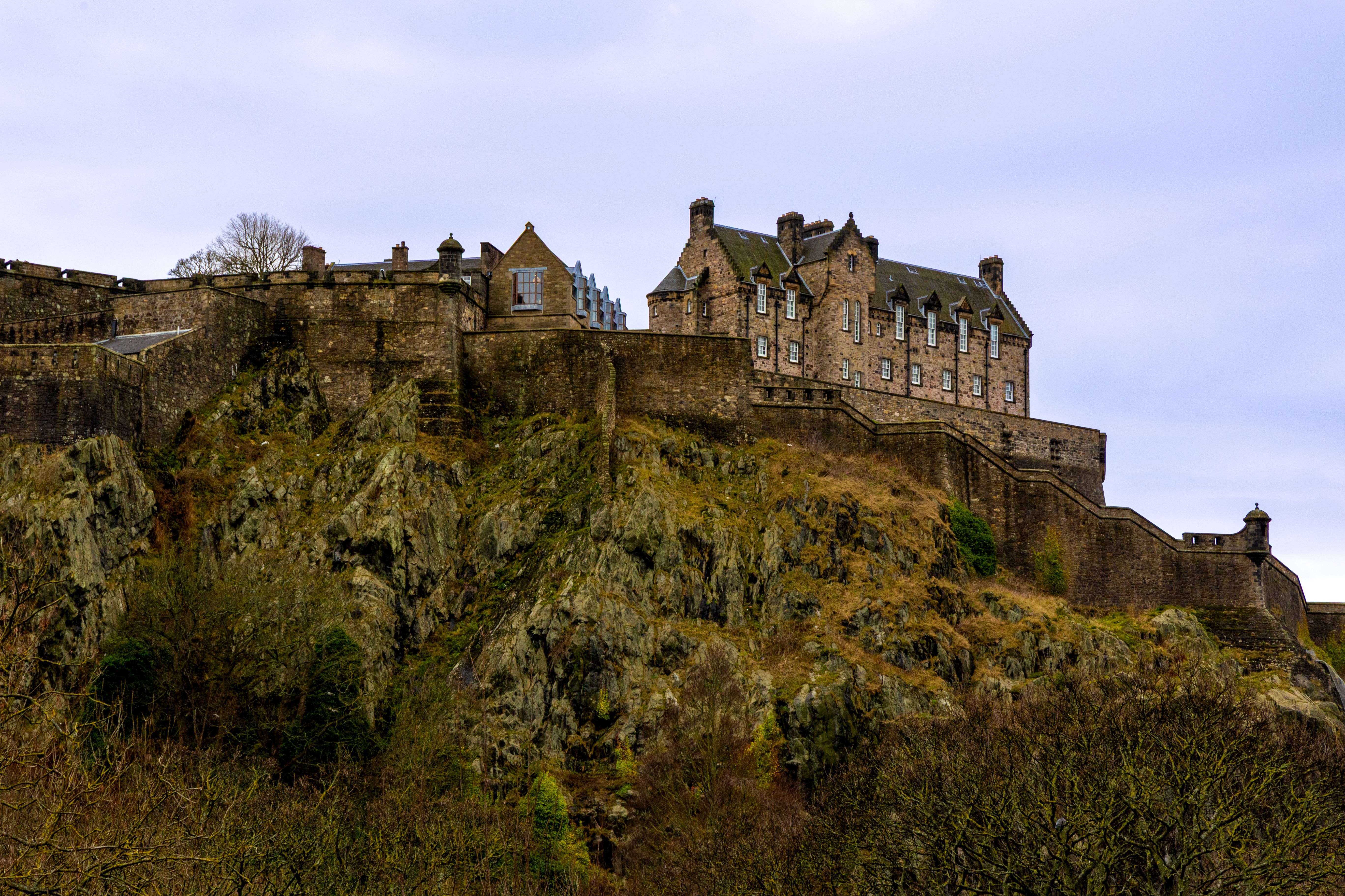 Edinburgh castle overlooking a steep landscape decline